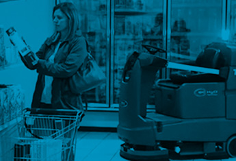 cleaning robotic Tennant AMR cleaning in grocery store