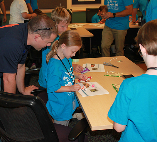 Kids making bristlebot project at Tennant Kids Day Kids making bristlebot project at Tennant Kids Day