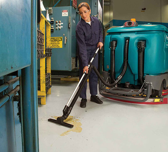 T17 Rider Scrubber cleaning in a manufacturing facility T17 Rider Scrubber cleaning in a manufacturing facility