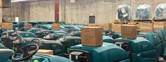 A warehouse filled with used floor scrubber Recon machines ready for sale A warehouse filled with used floor scrubber Recon machines ready for sale
