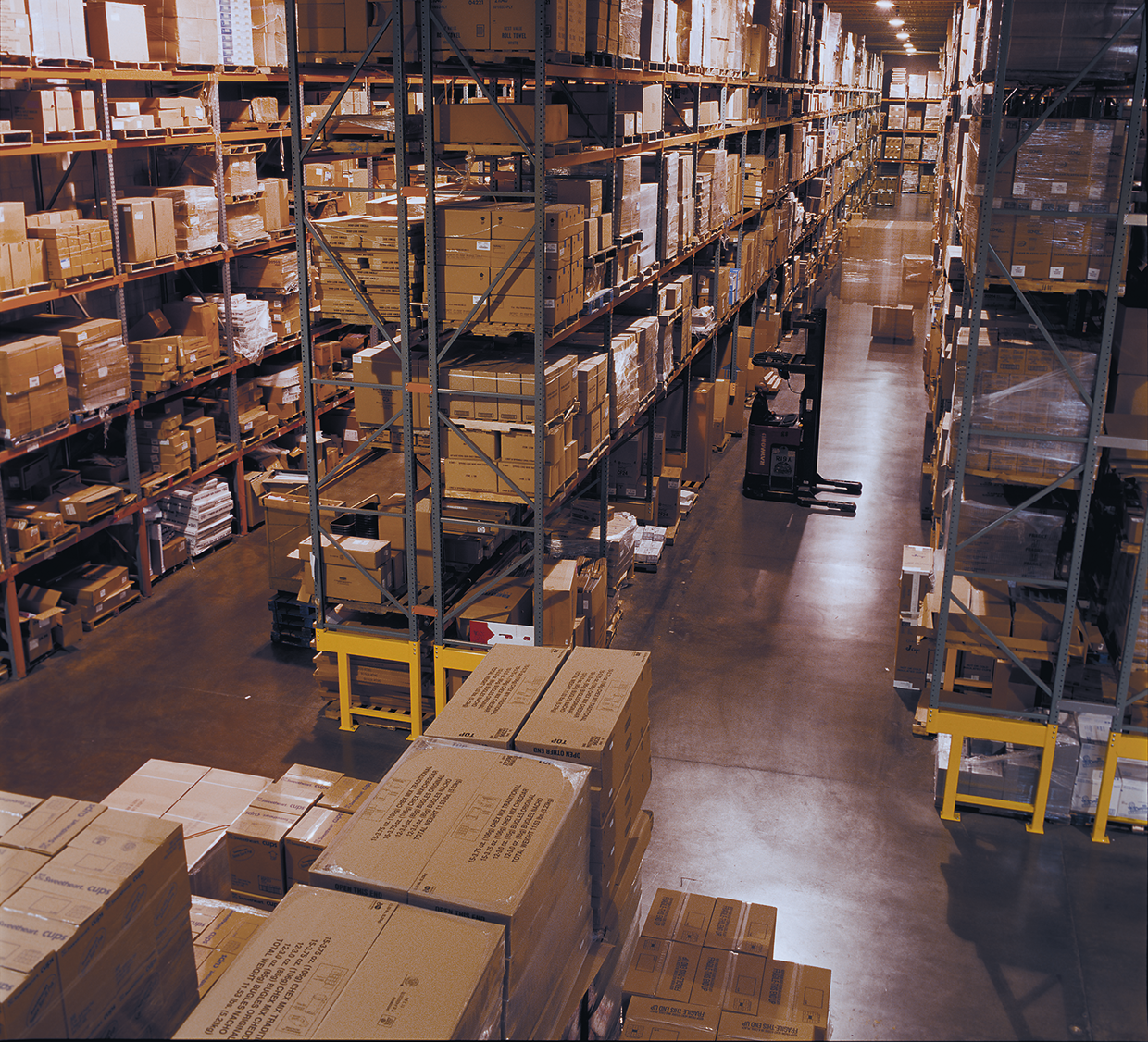 Warehouse floor with racks of product Warehouse floor with racks of product