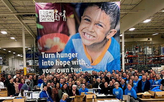 Tennant volunteers at Feed My Starving Children Tennant volunteers at Feed My Starving Children