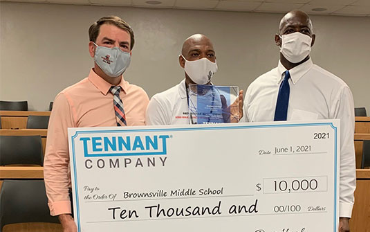 Alonzo Henley of Brownsville Middle School in Miami, Florida was presented with a $10,000 check for his school at a surprise celebration on Tuesday, June 1. Alonzo Henley of Brownsville Middle School in Miami, Florida was presented with a $10,000 check for his school at a surprise celebration on Tuesday, June 1.