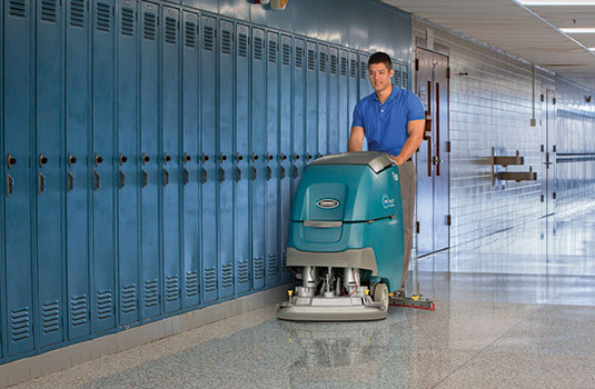T500 walk-behind scrubber cleaning school by lockers T500 walk-behind scrubber cleaning school by lockers