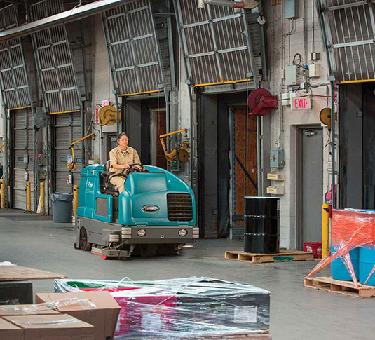 T20 Rider Floor Scrubber Cleaning a Logistics Facility T20 Rider Floor Scrubber Cleaning a Logistics Facility