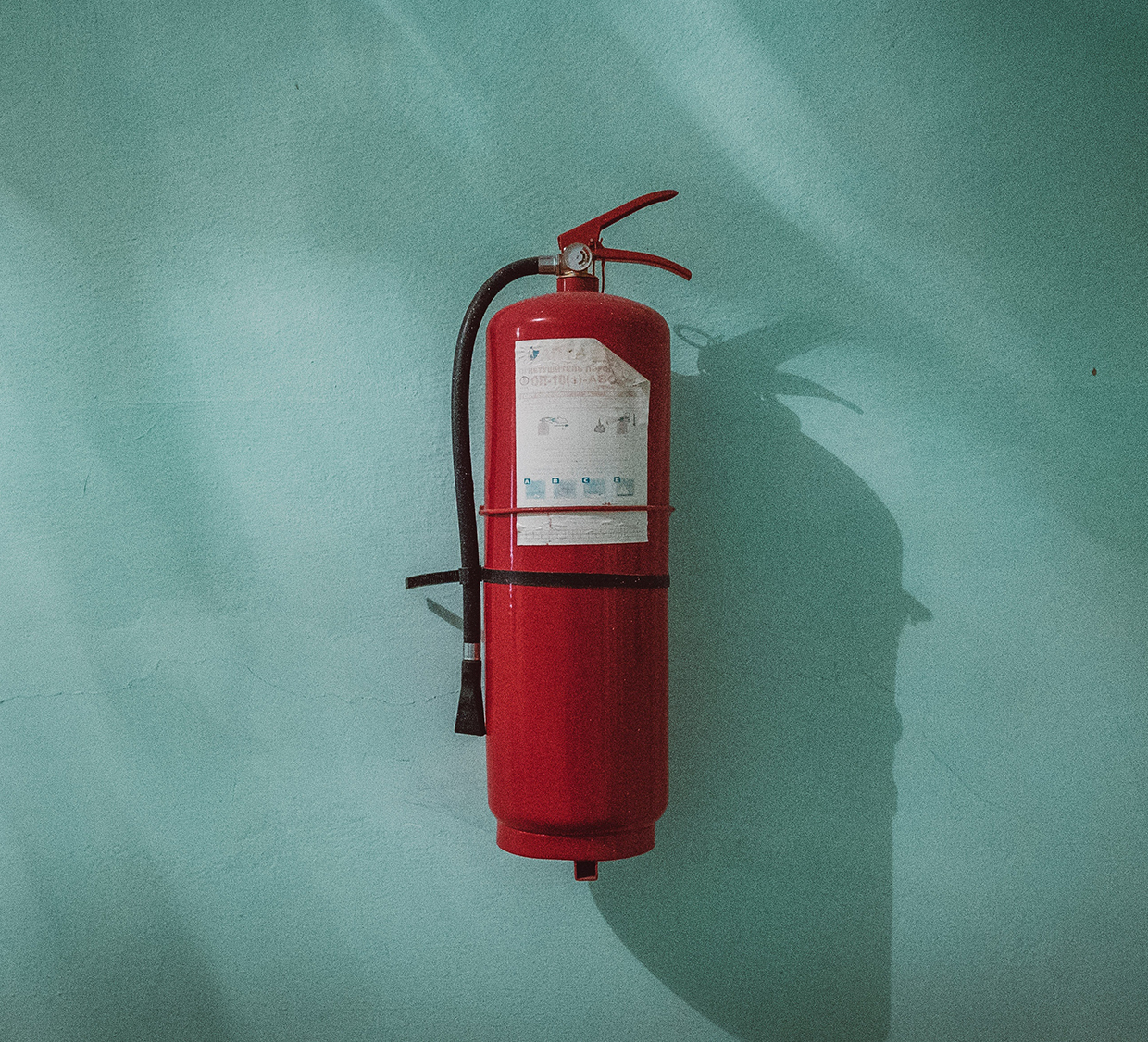 Fire extinguisher on wall Fire extinguisher on wall