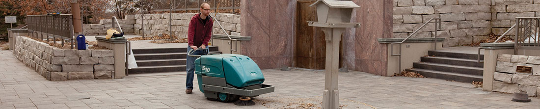 S10 Walk-Behind Sweeper cleaning outdoors S10 Walk-Behind Sweeper cleaning outdoors