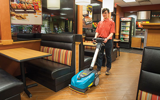 cleaning staff using CS5 walk-behind floor scrubber in convenience store to clean floor cleaning staff using CS5 walk-behind floor scrubber in convenience store to clean floor