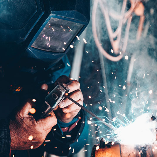welder in manufacturing shop welder in manufacturing shop