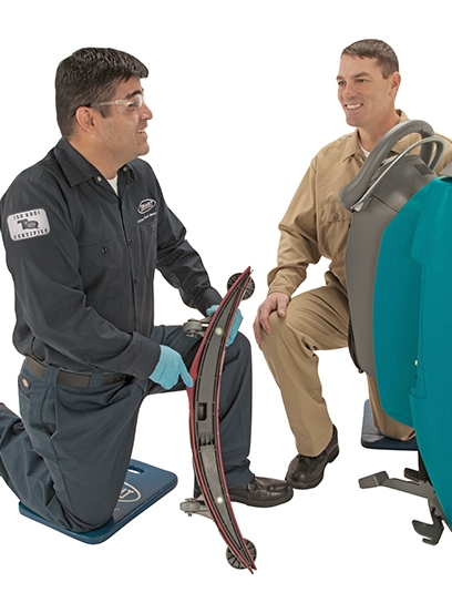 Tennant service technician and customer Tennant service technician and customer