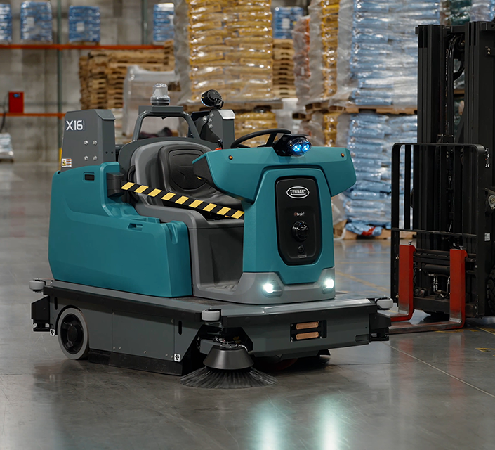 X16 SWEEP Autonomous Sweeper in a warehouse