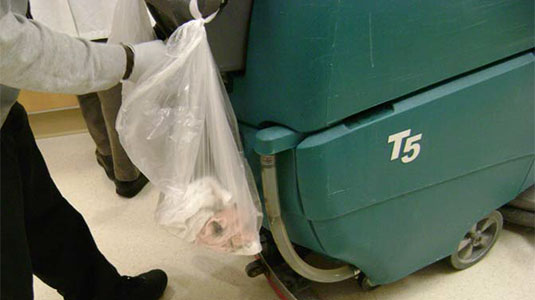 Example of customer hanging trash bags on their machine Example of customer hanging trash bags on their machine