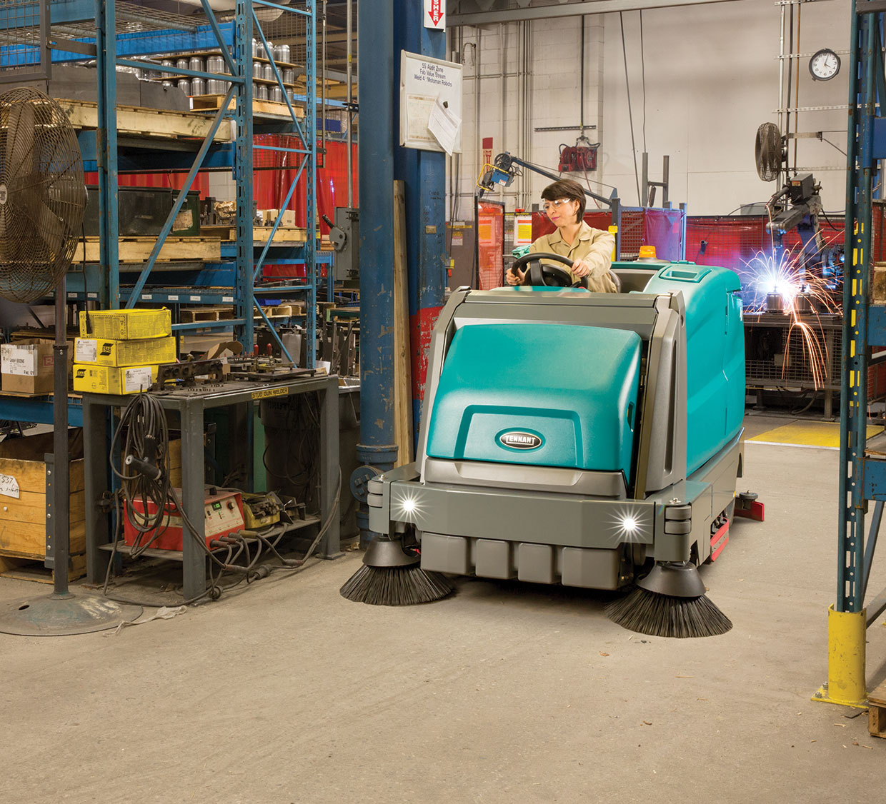 M17 Ride-On Sweeper-Scrubber in a manufacturing environment M17 Ride-On Sweeper-Scrubber in a manufacturing environment