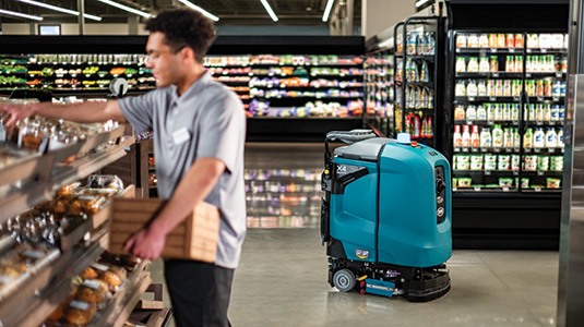 X4 ROVR Autonomous Floor Scrubber cleaning in a grocery store X4 ROVR Autonomous Floor Scrubber cleaning in a grocery store