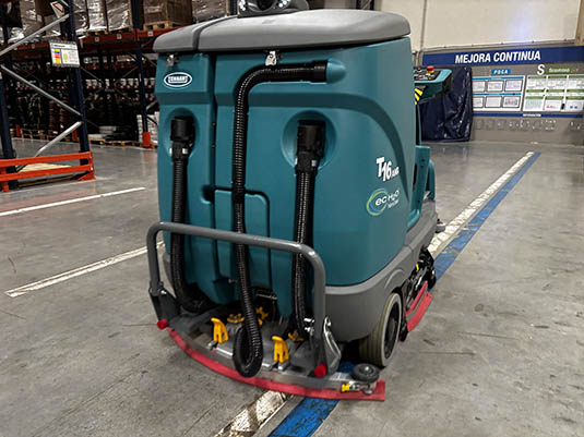 T16AMR autonomous cleaning robot cleaning a warehouse