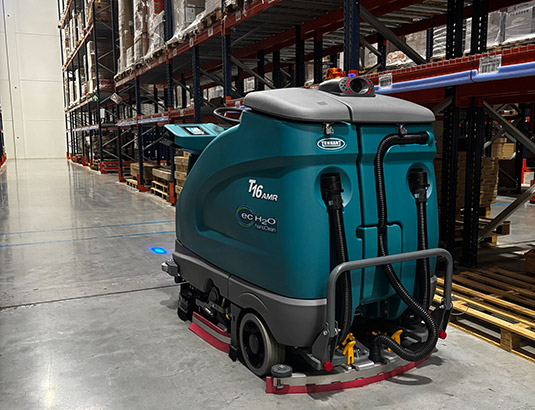 T16AMR autonomous cleaning robot cleaning a warehouse
