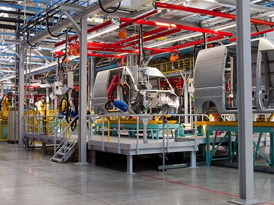 A clean floor in manufacturing plant: in an industrial environment, cleaning can help maintain productivity A clean floor in manufacturing plant: in an industrial environment, cleaning can help maintain productivity