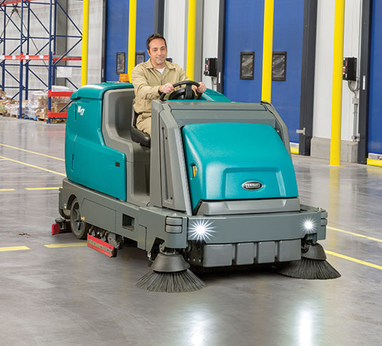 M17 Ride-On Sweeper-Scrubber cleaning a logistics facility