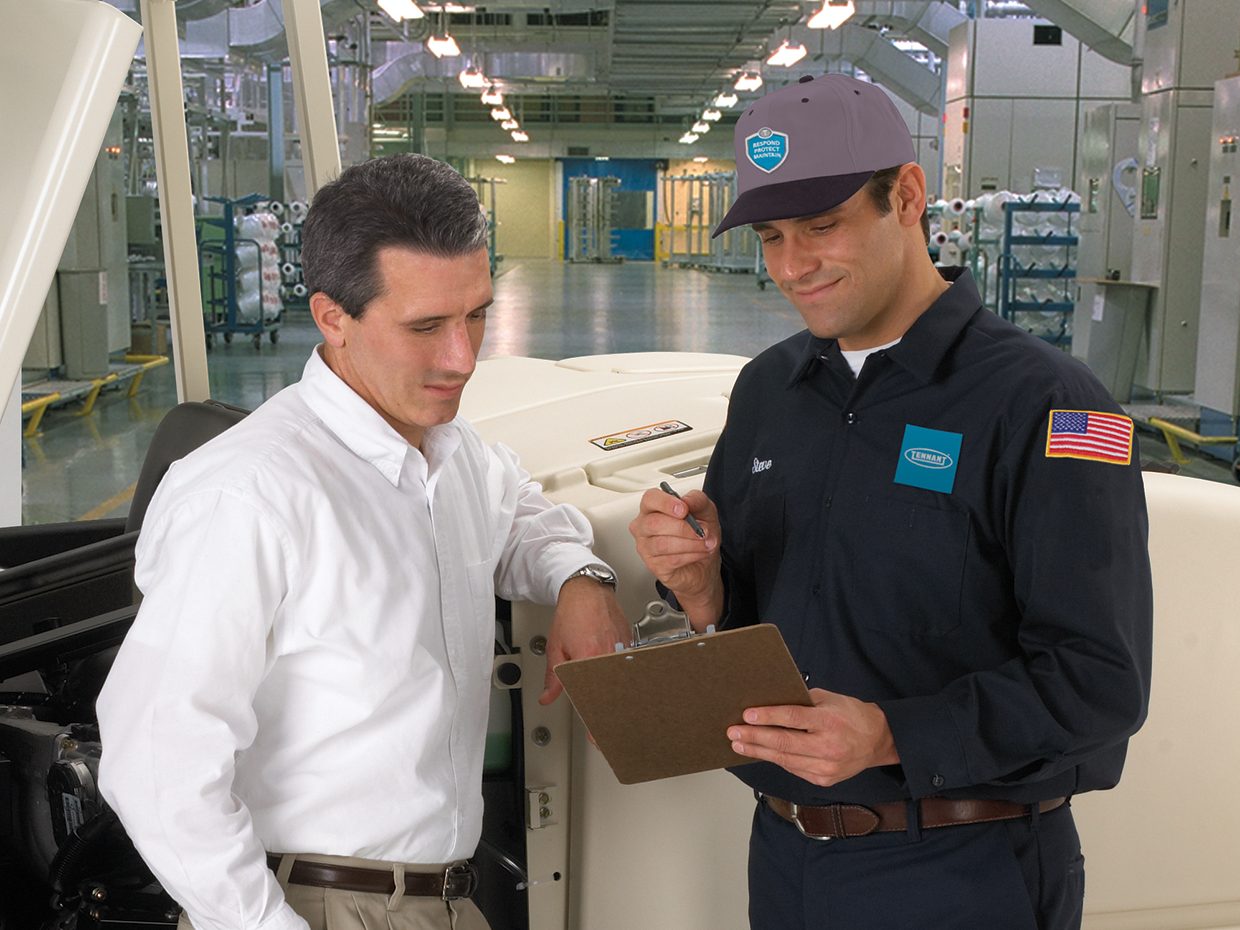 Service Technician and Customer viewing planned maintenance information Service Technician and Customer viewing planned maintenance information