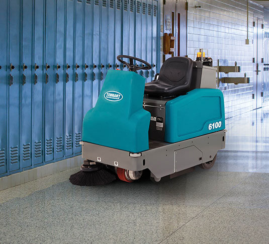 6100 Ride-On Sweeper cleaning in a school